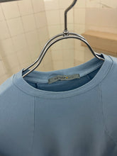 Load image into Gallery viewer, Late 1990s Mandarina Duck Powder Baby Blue Contemporary Cut Tee - Size XS