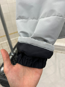2000s Samsonite 'Travel Wear' Glacier Blue Puffer Jacket - Size XL