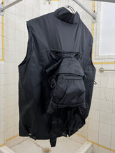 Load image into Gallery viewer, 2000s Samsonite ‘Travel Wear’ Paneled Vest with Packable Backpack - Size L