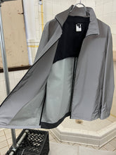 Load image into Gallery viewer, 2000s Samsonite &#39;Travel Wear&#39; Reflective Glass Jacket - Size XL