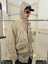 Load image into Gallery viewer, 1990s Katharine Hamnett Light Iridescent Beige Military Parka with Ribbed Neck Hood - Size OS